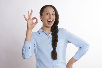 Woman Doing Money Hand Sign Woman Doing Money Hand Sign