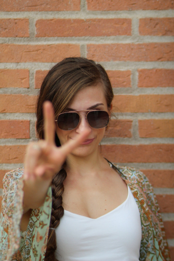 Woman Doing Peace Sign Woman Doing Peace Sign