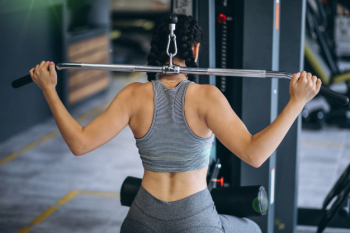 Woman exercising at the gym by herself Free Photo Woman exercising at the gym by herself Free Photo