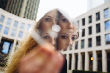 woman face reflection on mirror woman face reflection on mirror