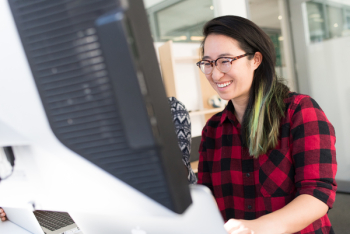 Woman Facing Computer Monitor Woman Facing Computer Monitor