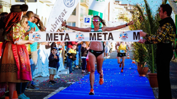 Woman Finish the Line on Going Marathon Woman Finish the Line on Going Marathon