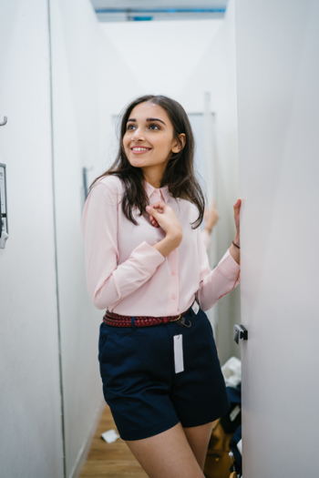 Woman Fitting Clothes Woman Fitting Clothes