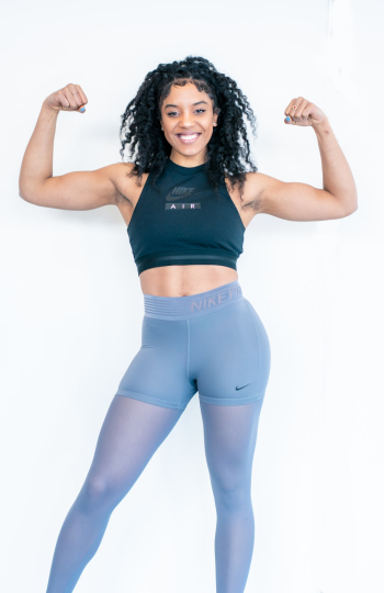 Woman Flexing Her Biceps Woman Flexing Her Biceps