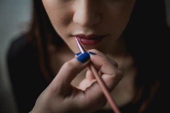Woman Getting Lip Makeup Woman Getting Lip Makeup