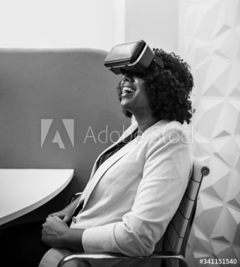 Woman having fun with a VR headset Woman having fun with a VR headset