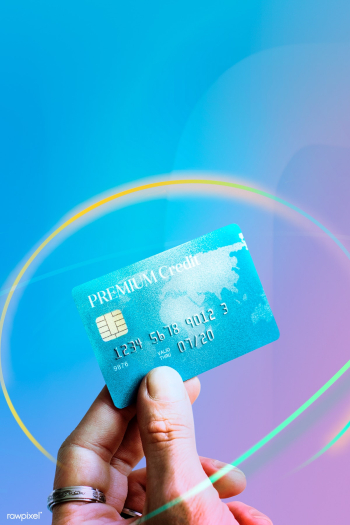 Woman holding a premium credit card