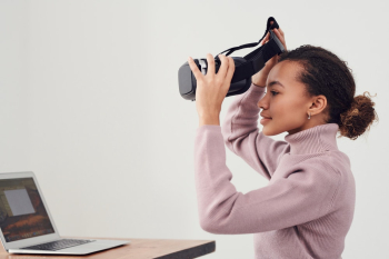 Woman Holding Black Vr Headset Woman Holding Black Vr Headset