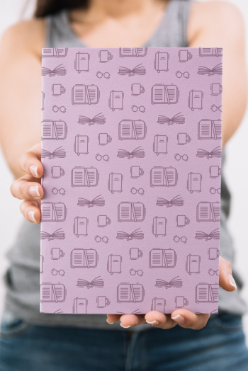 Woman holding book cover mockup Free Psd