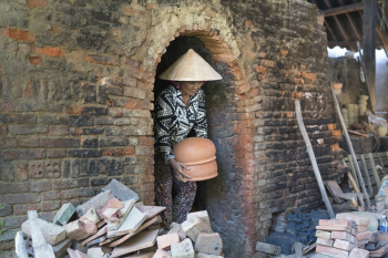 Woman Holding Clay Pots Woman Holding Clay Pots