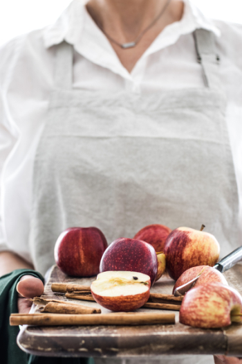 Woman holding fresh apples Woman holding fresh apples