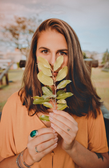 Woman Holding Green Flower Woman Holding Green Flower