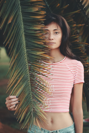 Woman Holding Green Leaf Woman Holding Green Leaf