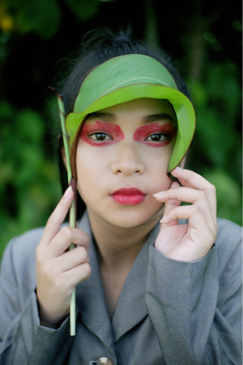 Woman Holding Green Leaf Woman Holding Green Leaf