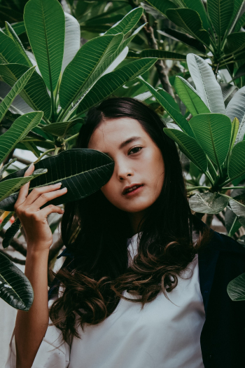 Woman Holding Green Leaf Woman Holding Green Leaf