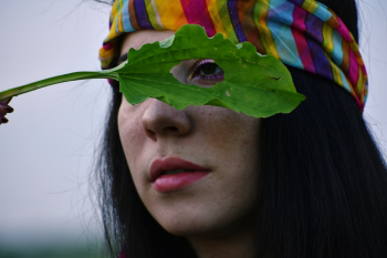 Woman Holding Green Leaf Woman Holding Green Leaf