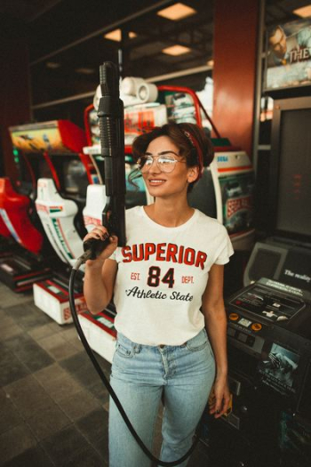 woman holding gun controller