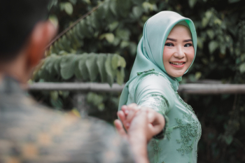 Woman Holding Hands With Another Person