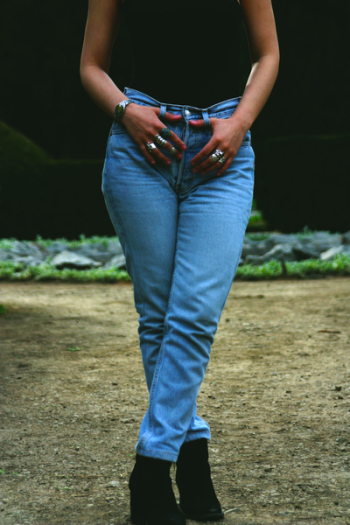 Woman Holding Her Jeans Woman Holding Her Jeans