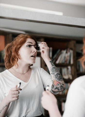 woman holding makeup rush woman holding makeup rush