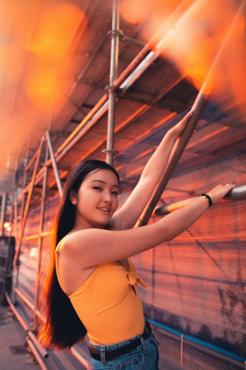 Woman Holding Metal Scaffolding Woman Holding Metal Scaffolding