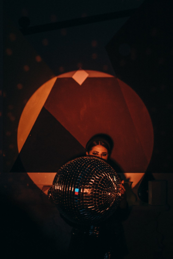Woman Holding Mirror Ball Woman Holding Mirror Ball
