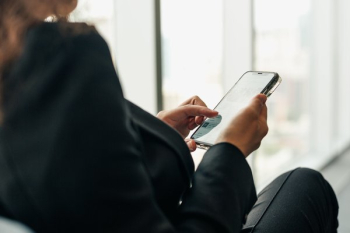 Woman Holding Phone Browsing Social Media Woman Holding Phone Browsing Social Media