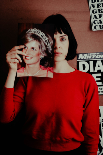 Woman Holding Photo of Woman Woman Holding Photo of Woman