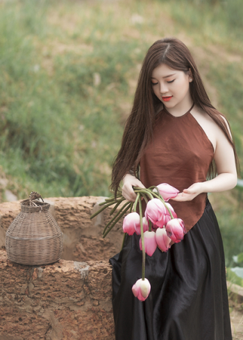 Woman Holding Pink Tulips Woman Holding Pink Tulips
