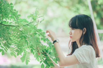 Woman Holding Plant Woman Holding Plant