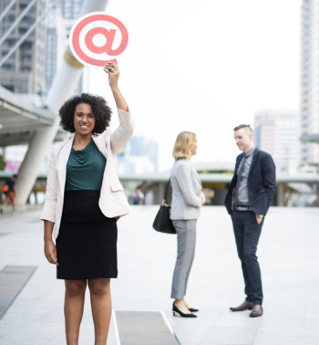 Woman Holding @ Sign Woman Holding @ Sign