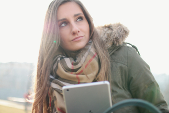 Woman Holding Silver Ipad Woman Holding Silver Ipad