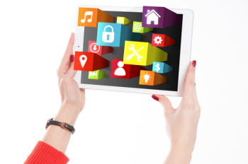 Woman Holding Tablet with App Icons Woman Holding Tablet with App Icons