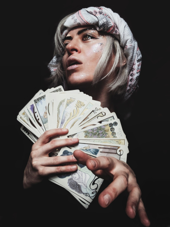Woman Holding Tarot Cards Woman Holding Tarot Cards