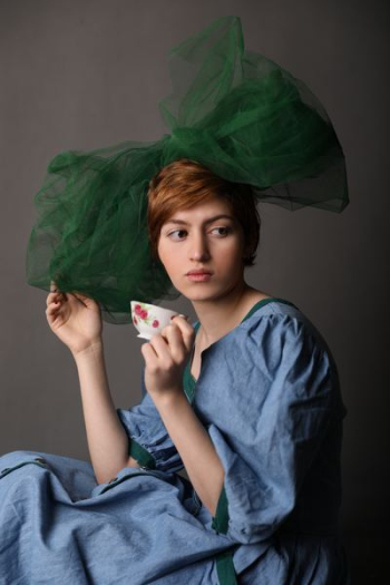 woman holding teacup woman holding teacup