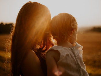 Woman Holding Toddler Woman Holding Toddler