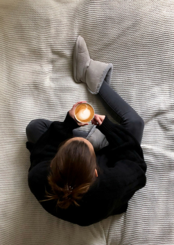 Woman Holds a Cup With Espresso Woman Holds a Cup With Espresso