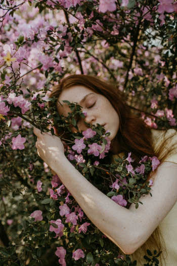 Woman Hugging Flowering Tree Woman Hugging Flowering Tree