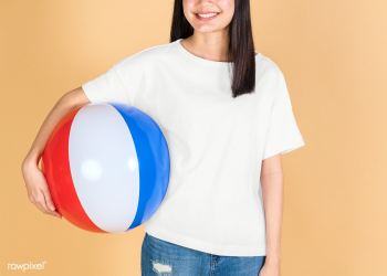 Woman in a white tee mockup holding a beach ball on a beige background | Free  transparent png - 2307288