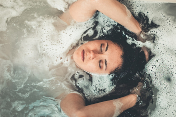 Woman in Bath Tub Woman in Bath Tub