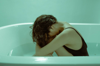 Woman in Bath Tub Woman in Bath Tub