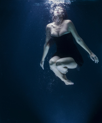 Woman in Black Dress Underwater Woman in Black Dress Underwater