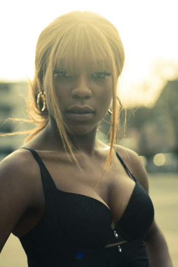 Woman in Black Spaghetti Strap Top Looking Fierce Woman in Black Spaghetti Strap Top Looking Fierce