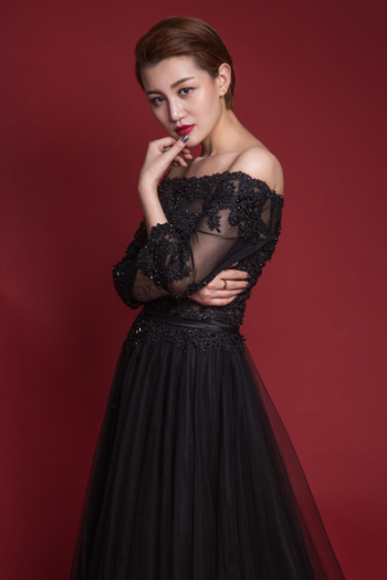 Woman in Black Strapless Dress Posing Woman in Black Strapless Dress Posing