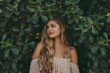 Woman in Front Bushes Woman in Front Bushes