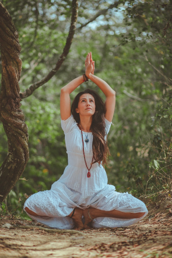 Woman in Meditating Position Woman in Meditating Position