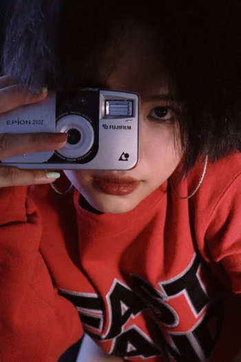 Woman in Red and White Hoodie Holding White Smartphone · Free Stock Photo