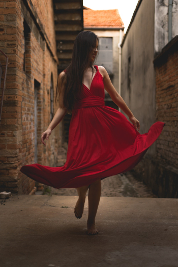 Woman in Red Dress Standing on Alley Woman in Red Dress Standing on Alley