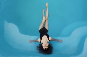 woman in swimming pool woman in swimming pool