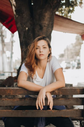 woman in white crew-neck shirt